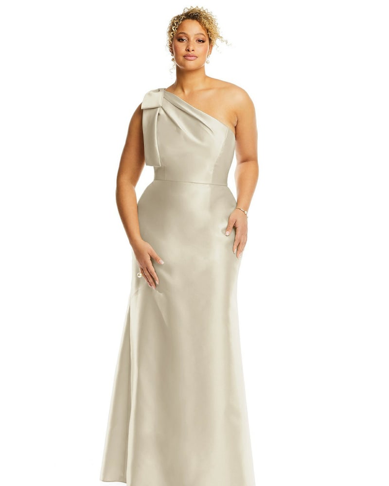 Front of a model wearing a size 20W Bow One-Shoulder Satin Trumpet Gown in Champagne by Alfred Sung. | dia_product_style_image_id:267125